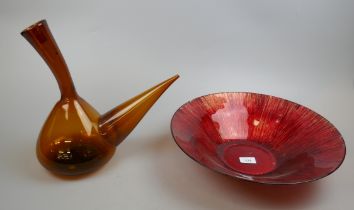 Amber glass porron together with a glass bowl