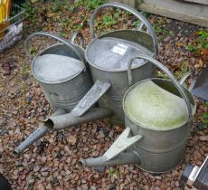 3 galvanised watering cans