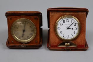 2 travelling clocks