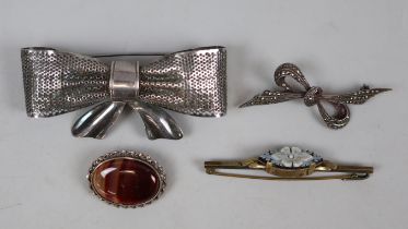 4 silver brooches