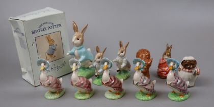 Collection of Beatrix Potter figurines, some in boxes