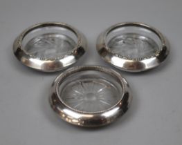3 silver rimmed glass coasters