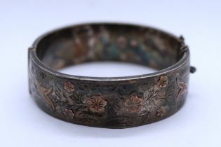 Silver engraved and gold flowered bangle