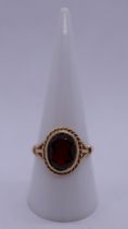 9ct gold garnet set ring - Size Q