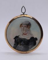 Gold mounted miniature portrait