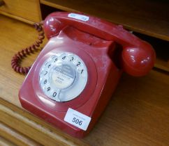 Red rotary telephone