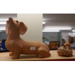 Terracotta Dachshund dog by Dora Barrett 'RA' together with another - Approx height 29cm