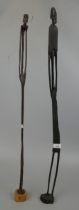 2 tall African carved figures - Approx height of tallest 89cm