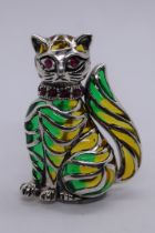 Silver enamel ruby eyed cat brooch