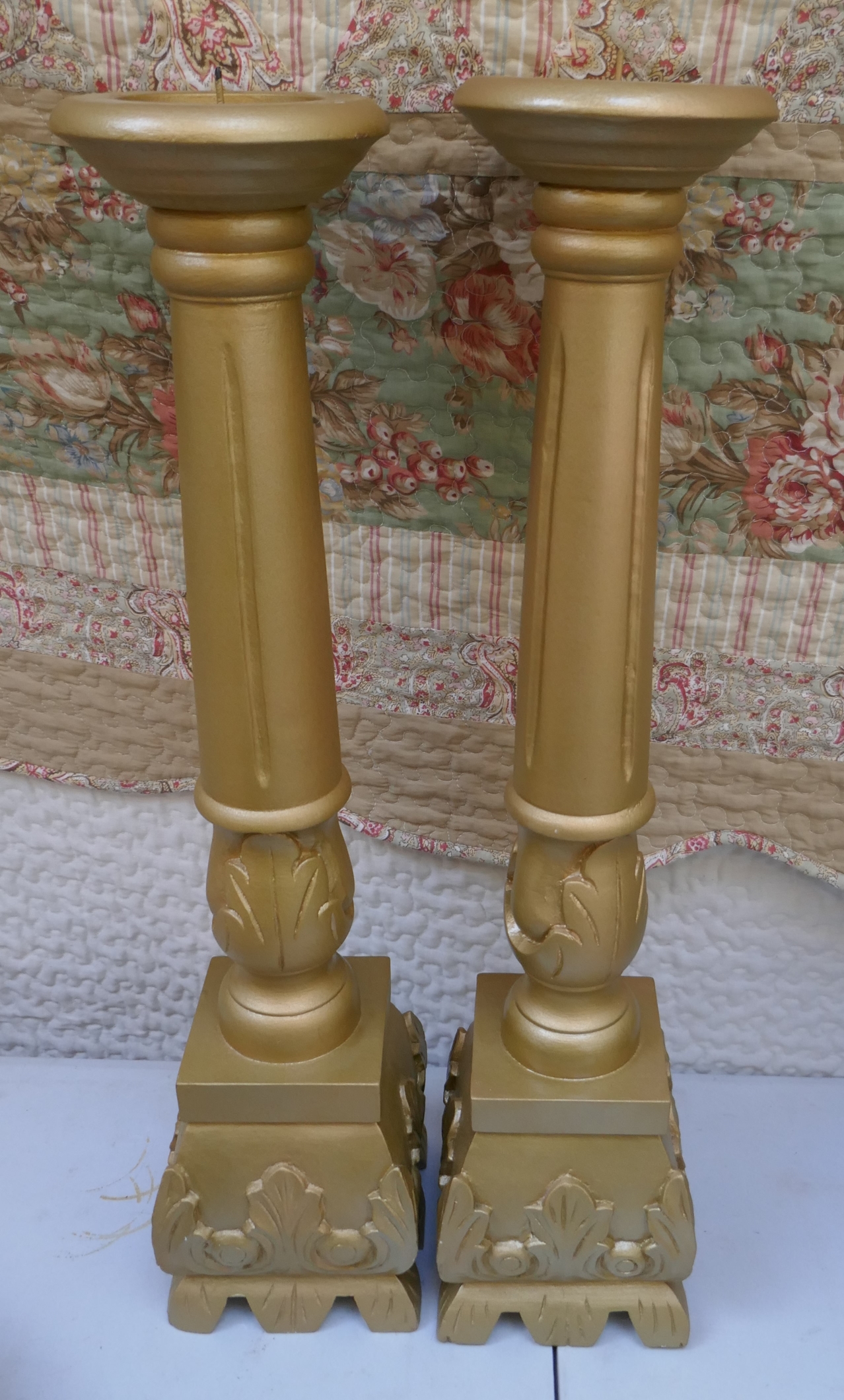 Pair of large gilt candlesticks