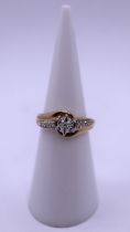 9ct gold diamond solitaire ring with diamond encrusted shoulders - Size I