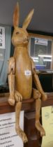 Large wooden articulated rabbit figure