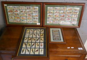 Collection of framed cigarette cards