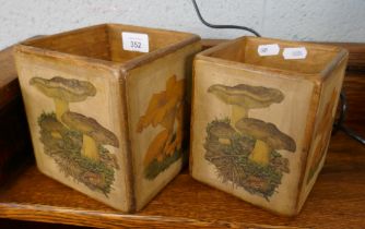 2 storage boxes adorned with mushrooms