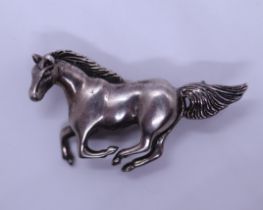 Hallmarked silver horse brooch