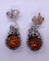 Silver and amber hedgehog earrings