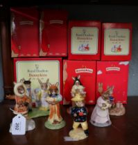 7 Bunnykins figurines in original boxes by Royal Doulton