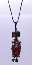 Hallmarked silver necklace with articulated figure pendant