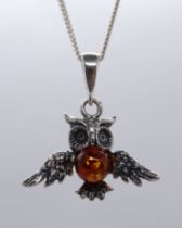 Silver and amber owl pendant on chain