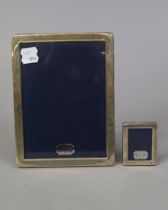 Harrods hallmarked silver photo frame together with a smaller one