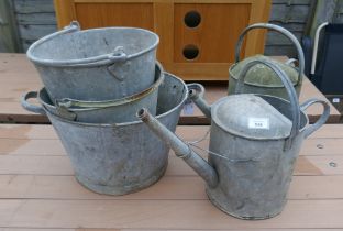 3 galvanized buckets together with 2 galvanized watering cans