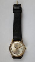 Gents gold Garrard watch in working order