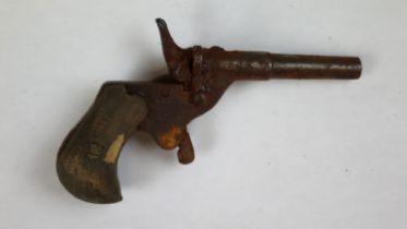 Early toy hand gun