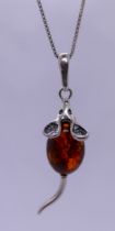 Silver and amber mouse pendant on chain