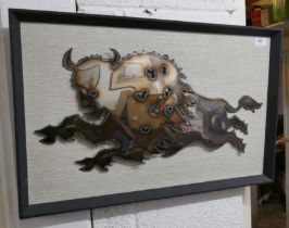 Framed metal artwork of a bull