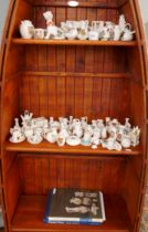 Large collection of WH Goss crested ware together with guide books