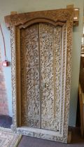 Intricately carved pair of Eastern doors and doorframe - Approx size: Width of frame: 94cm H: 197cm