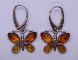 Pair of silver & amber butterfly earrings