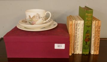 Beatrix Potter books together with cased trio