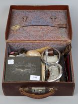 Small leather suitcase and contents to include pewter, tobacco pipe etc.