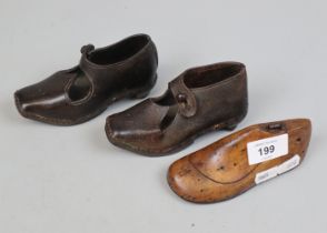 Child's shoe former together with a pair of child's Victorian clogs