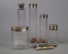 Collection of hallmarked silver topped glassware