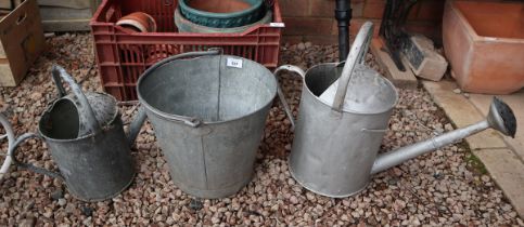 2 galvanised watering cans and a bucket