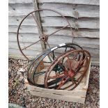 Set of 5 metal wheels together with a cast iron rabbit