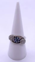 18ct white gold sapphire and diamond ring - Size N