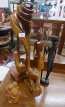 Collection of carved wooden items to include tribal - Approx height of tallest 51cm