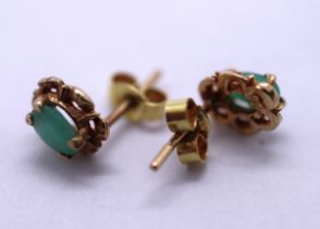 Pair of 9ct gold emerald stud earrings