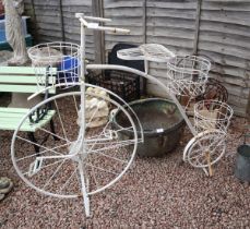 Wrought iron plant stand in the form of a penny farthing