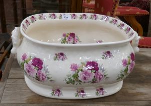 Ceramic footbath adorned with flowers