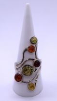 Silver and amber ring