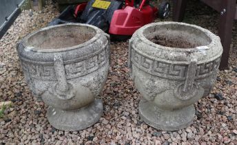 Pair of stone pedestal planters