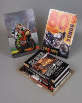 Collection of motorcycling books together with 2 small tin pictures