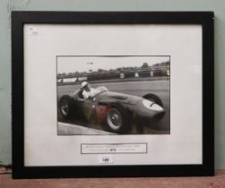 Framed photograph of Stirling Moss at Silverstone Grand Prix 1956 - Approx 55cm x 44cm