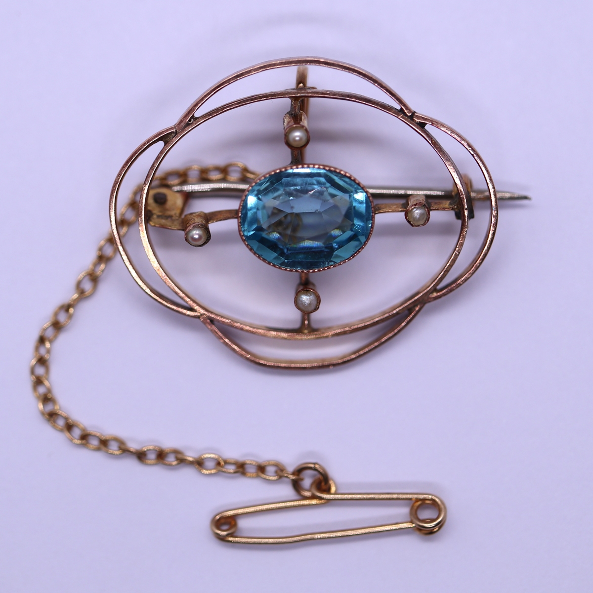 Antique 9ct gold blue topaz & pearl set brooch