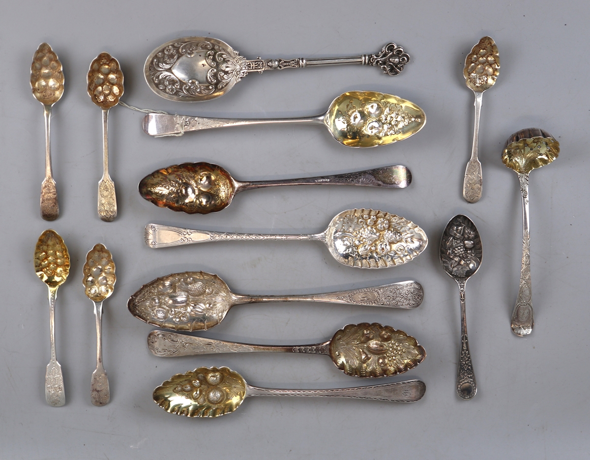 13 assorted hallmarked silver berry spoons - Approx weight: 592g together with another.