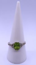 9ct gold peridot & diamond set ring - Size R